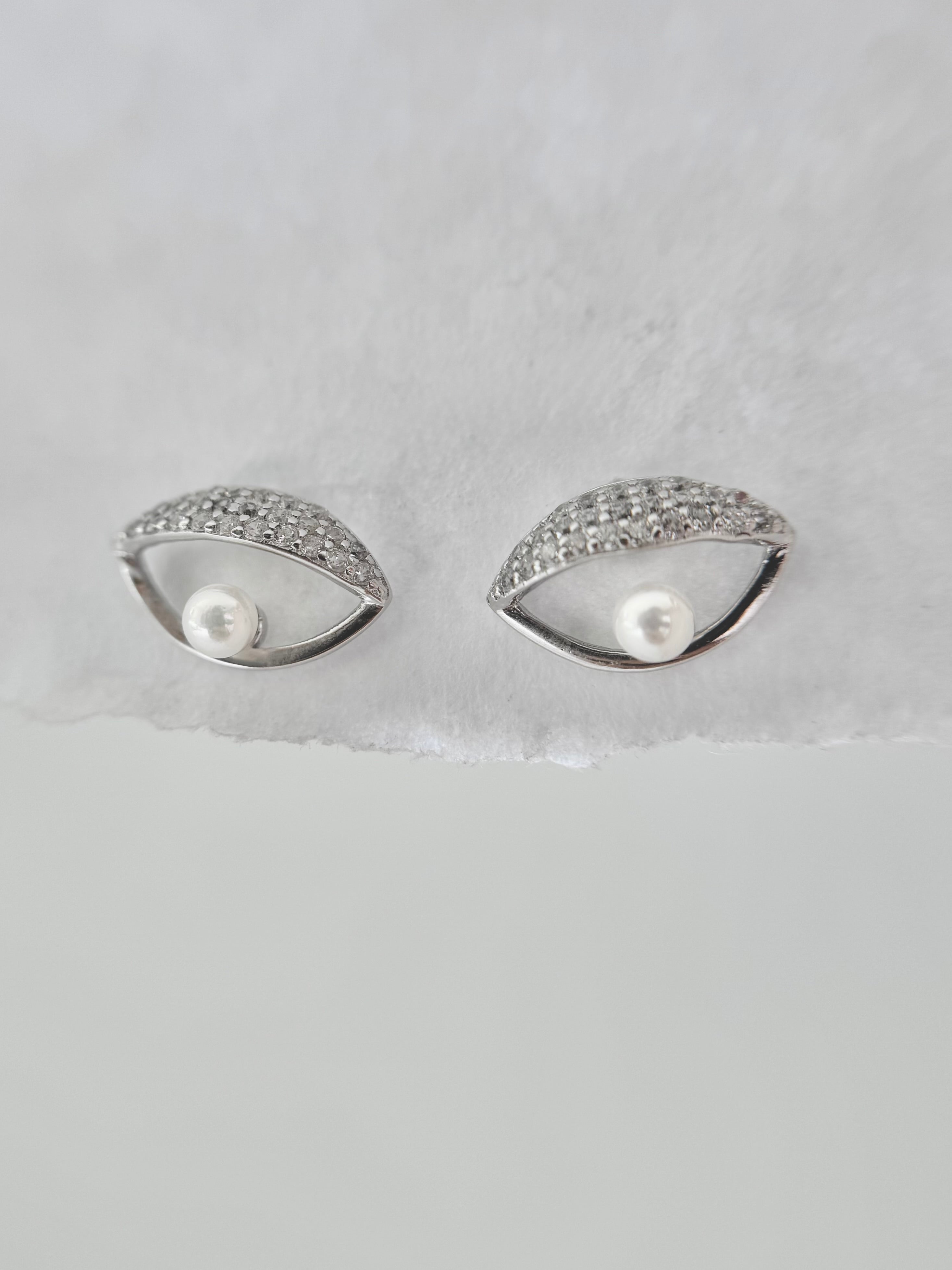 White Eye Earrings