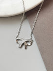 Caelis Bow Necklace